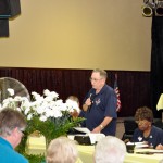 Lady speaking in meeting